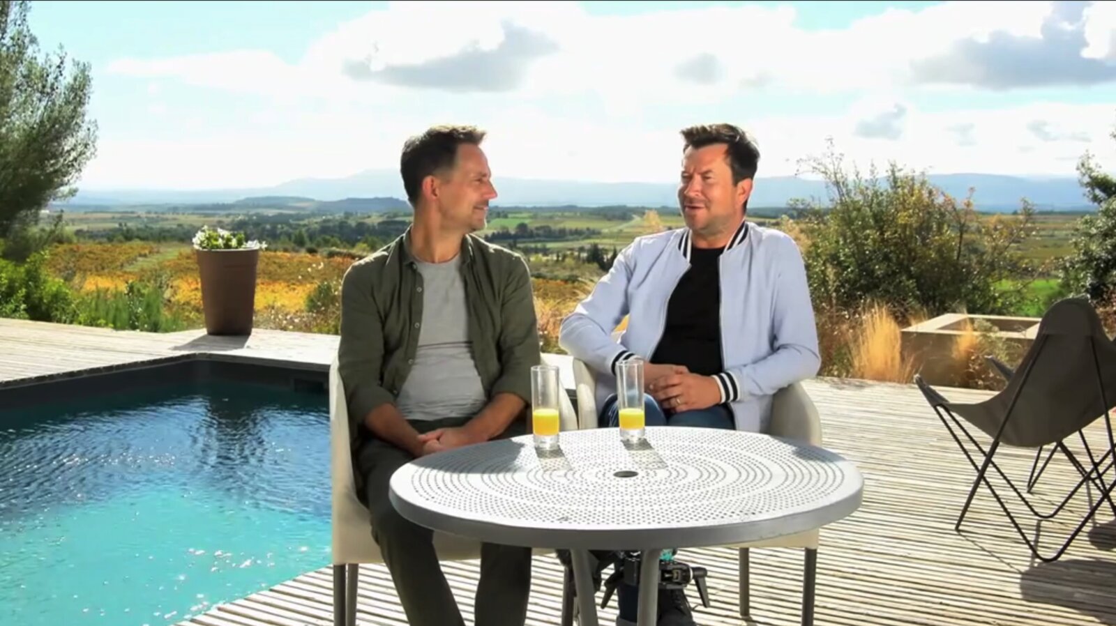 Ian and Anthony filmed by the pool of their five-bedroom chambre d'hôte in Caunes-Minervois, southern France, for Channel 4's A New Life in the Sun.